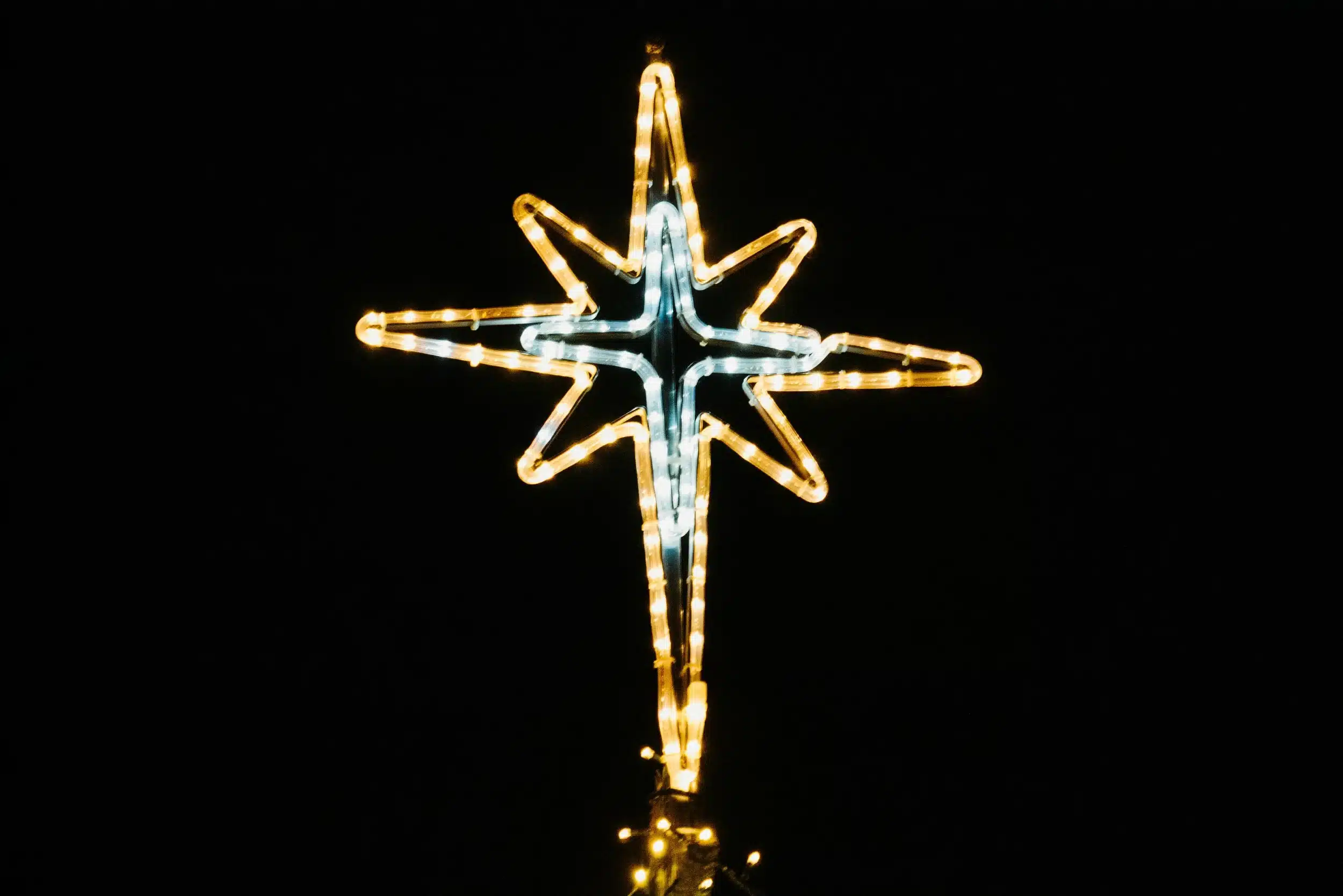 Bright Christmas star light against the dark evening sky