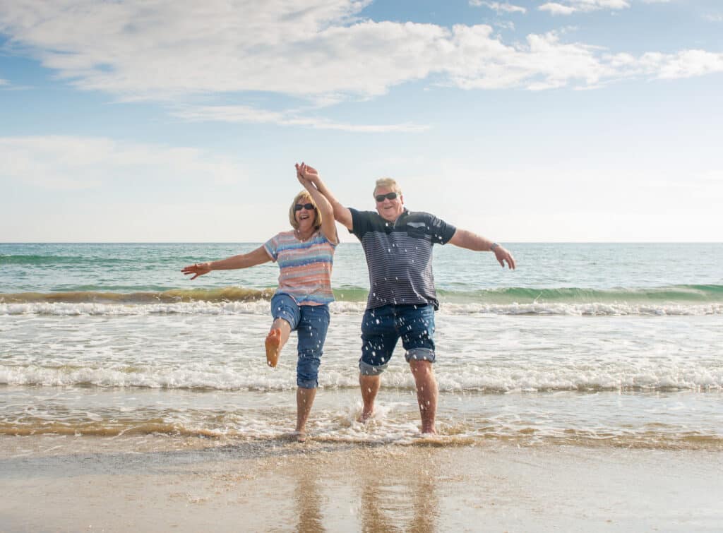 Redcar Beach Caravan Park Open Weekend: 22 – 25 May 2026 1 Couple joyfully playing at beach