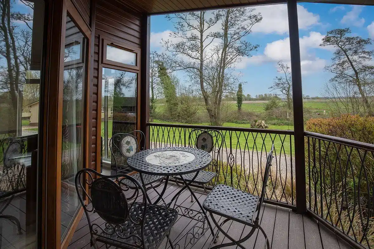 The Ultimate Guide to Buying a Holiday Home in Norfolk and Suffolk 5 View from a Waveney River Centre lodge decking space