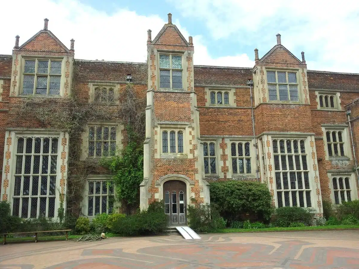 Historic sites in Suffolk: Kentwell Hall, a beautifully restored Tudor manor with historic gardens.