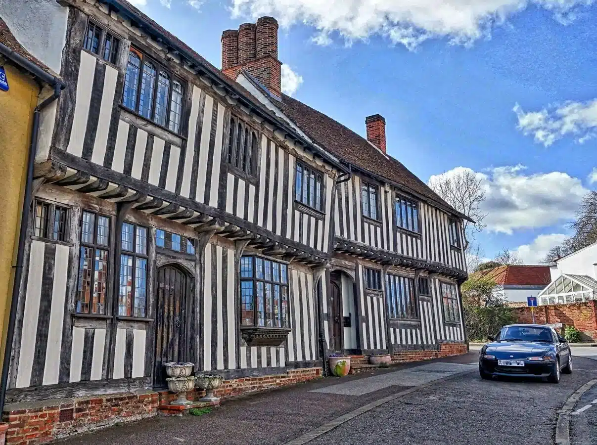 Historic sites in Suffolk: The picturesque medieval village of Lavenham, known for its well-preserved Tudor buildings.