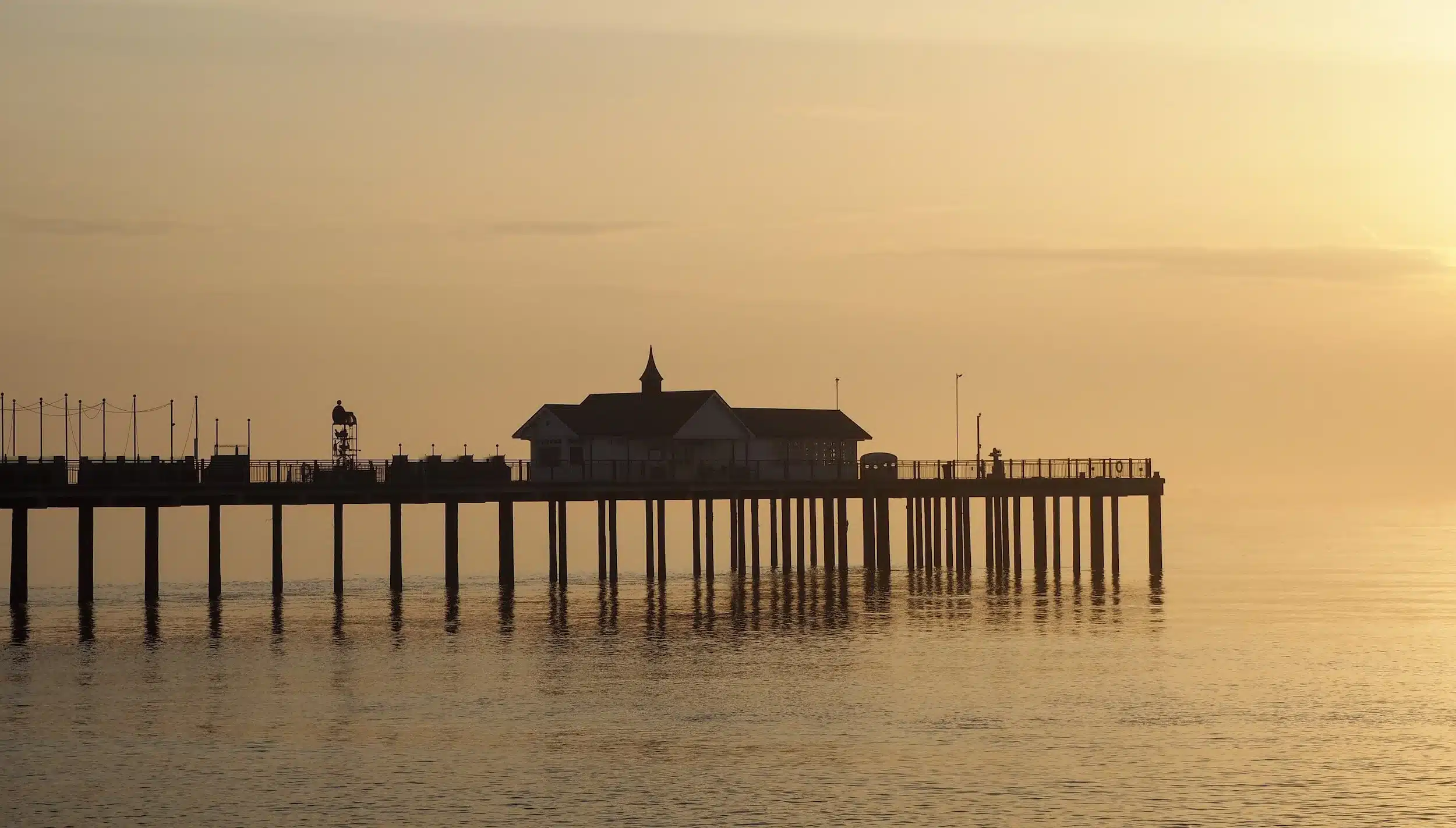 The Ultimate Guide to Buying a Holiday Home in Norfolk and Suffolk 7 Southwold Pier in the sunset
