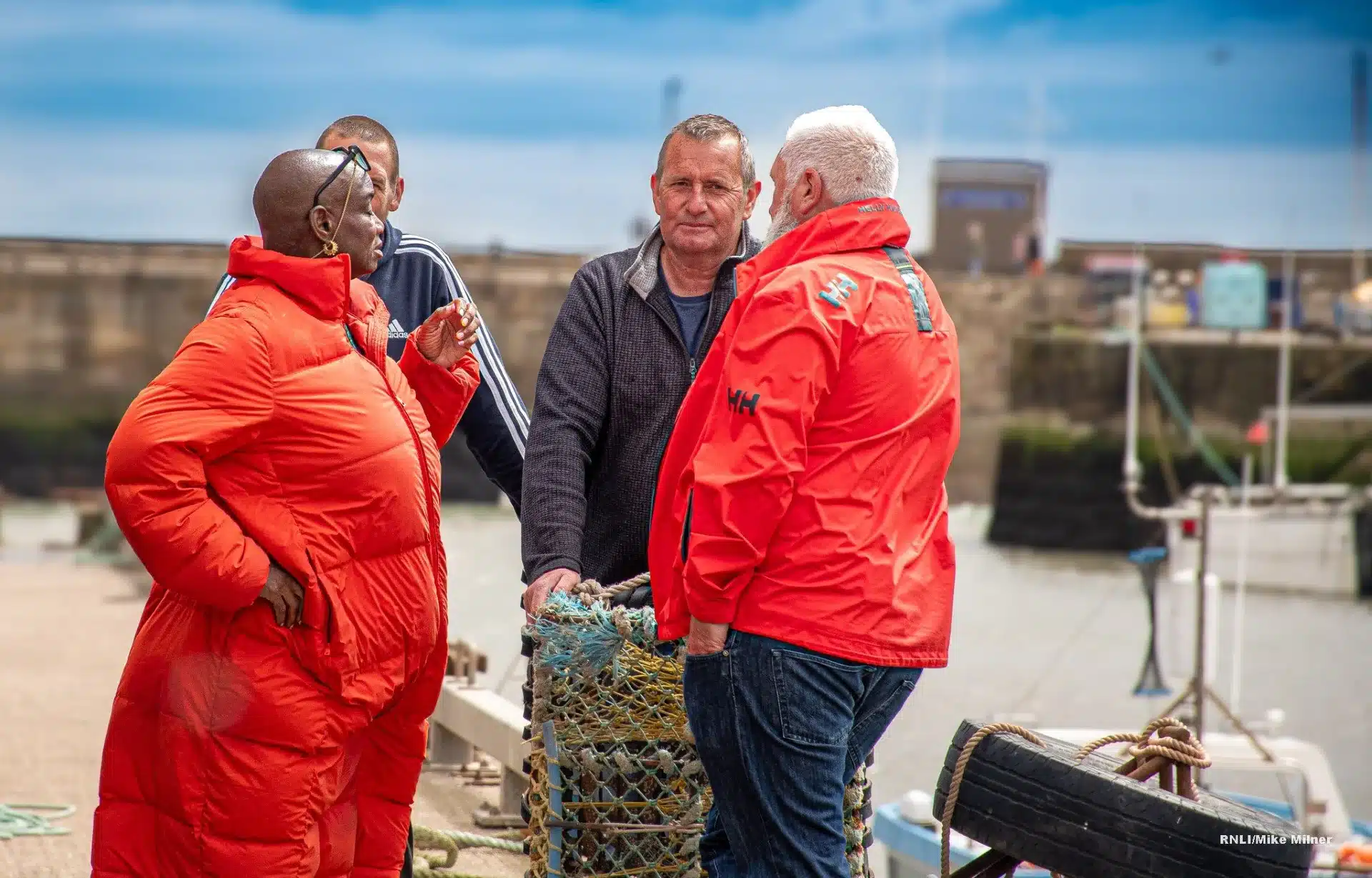 Andi Oliver chats with volunteer crew Richard Pockley, Bob Taylor and Mike Ellison during filming of Fabulous Feasts in Bridlington.
