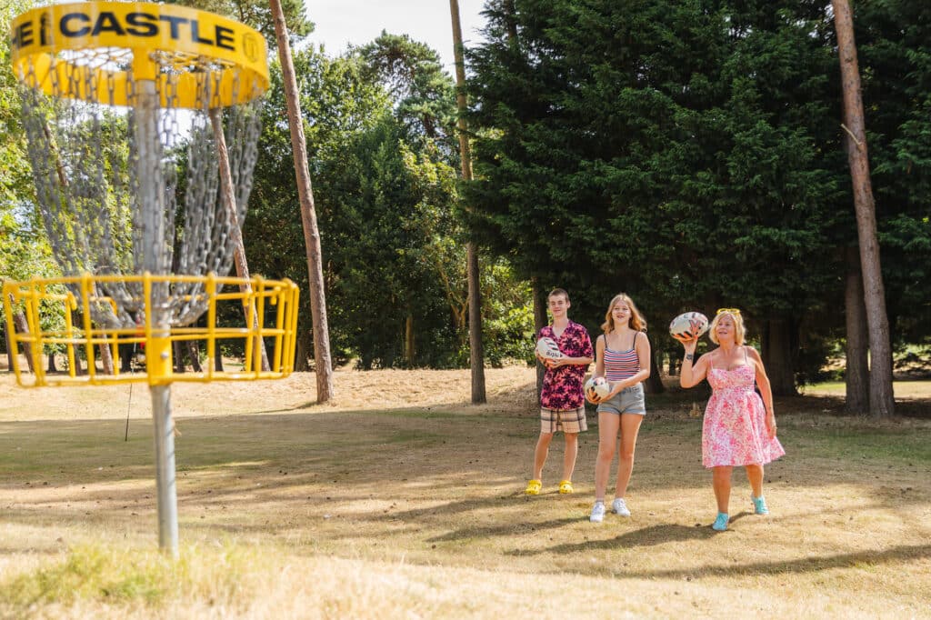 Caldecott Hall Country Park Tea, Cake & Tour Open Day – 11th July 2026 3 A woman and two younger children playing rugby golf.